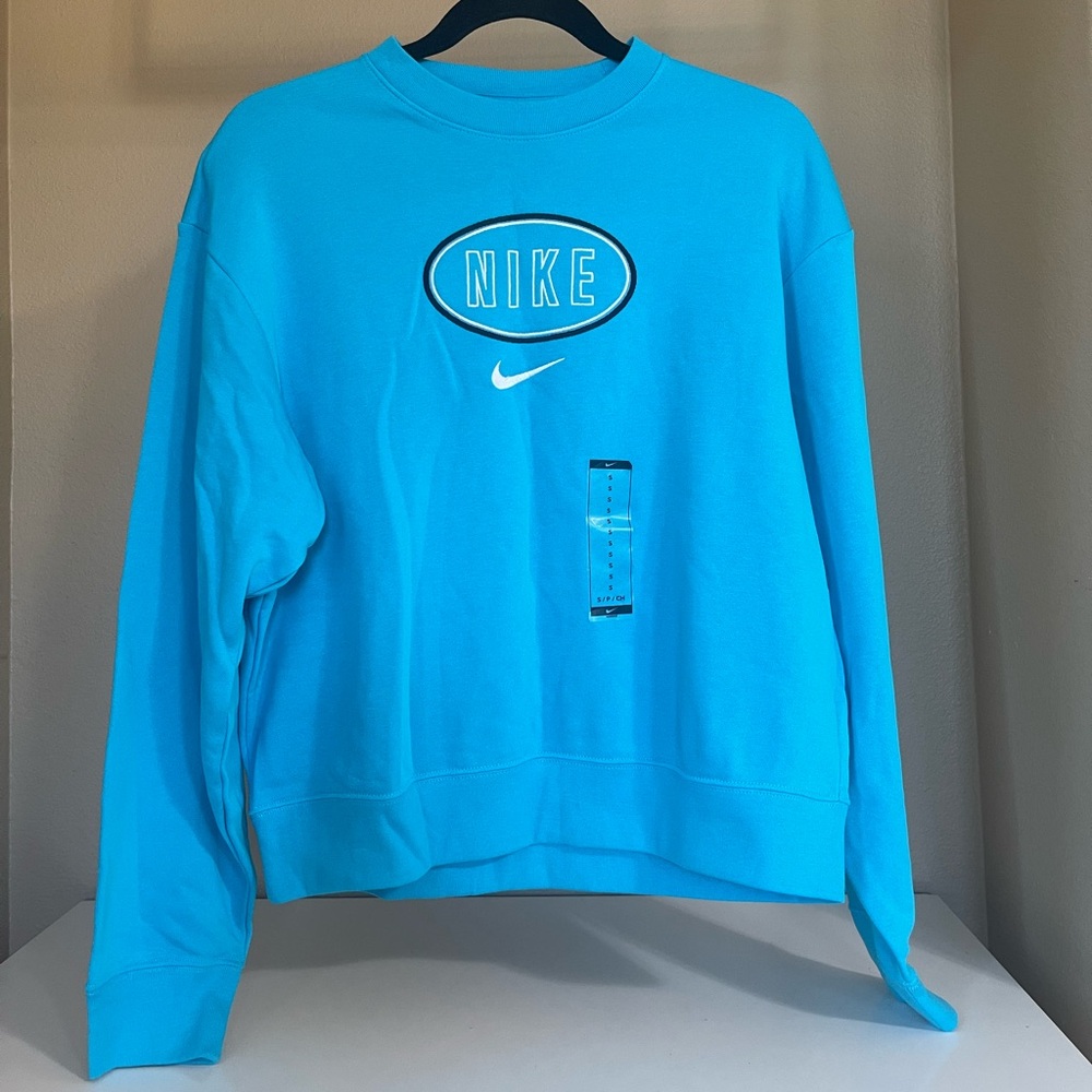 Nike Women’s Crewneck Sweater Center Swoosh Embroidery, in color blue. NWT